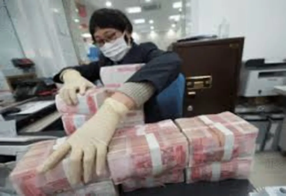 CHINA - China dezinfectează banii pentru a stopa epidemia de coronavirus