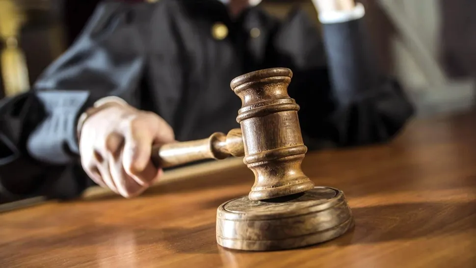 Directoare trimisă în judecată