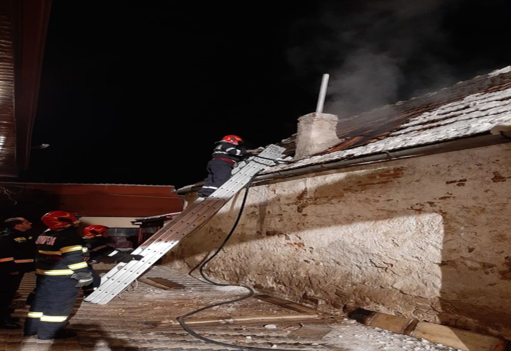 Casă în flăcări, în Veștem